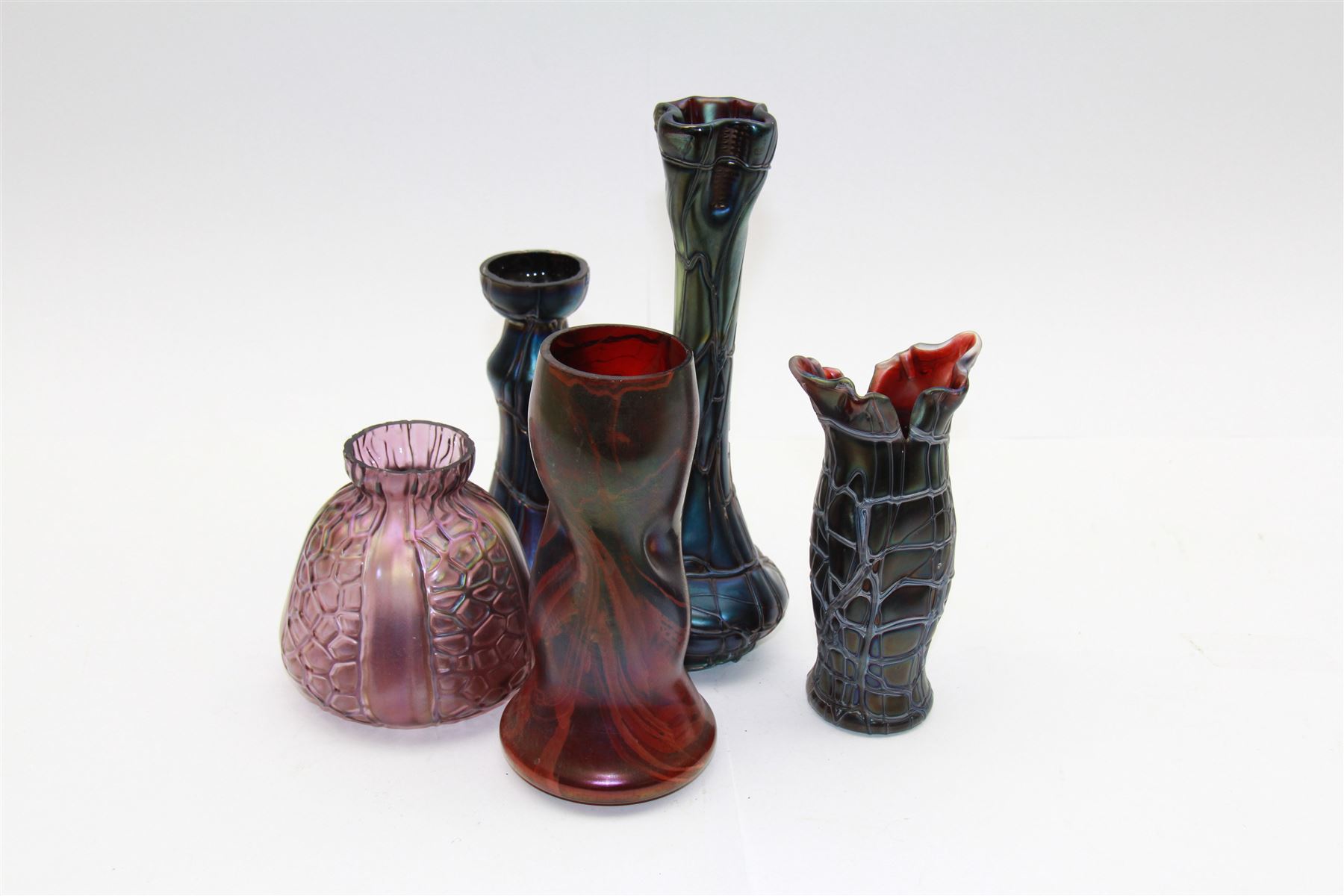 Five Austrian Art Nouveau glass vases, to include Pallme-Konig example with split fluted rim, two similar Kralik examples with threaded vein decoration and two others, tallest H21.5cm