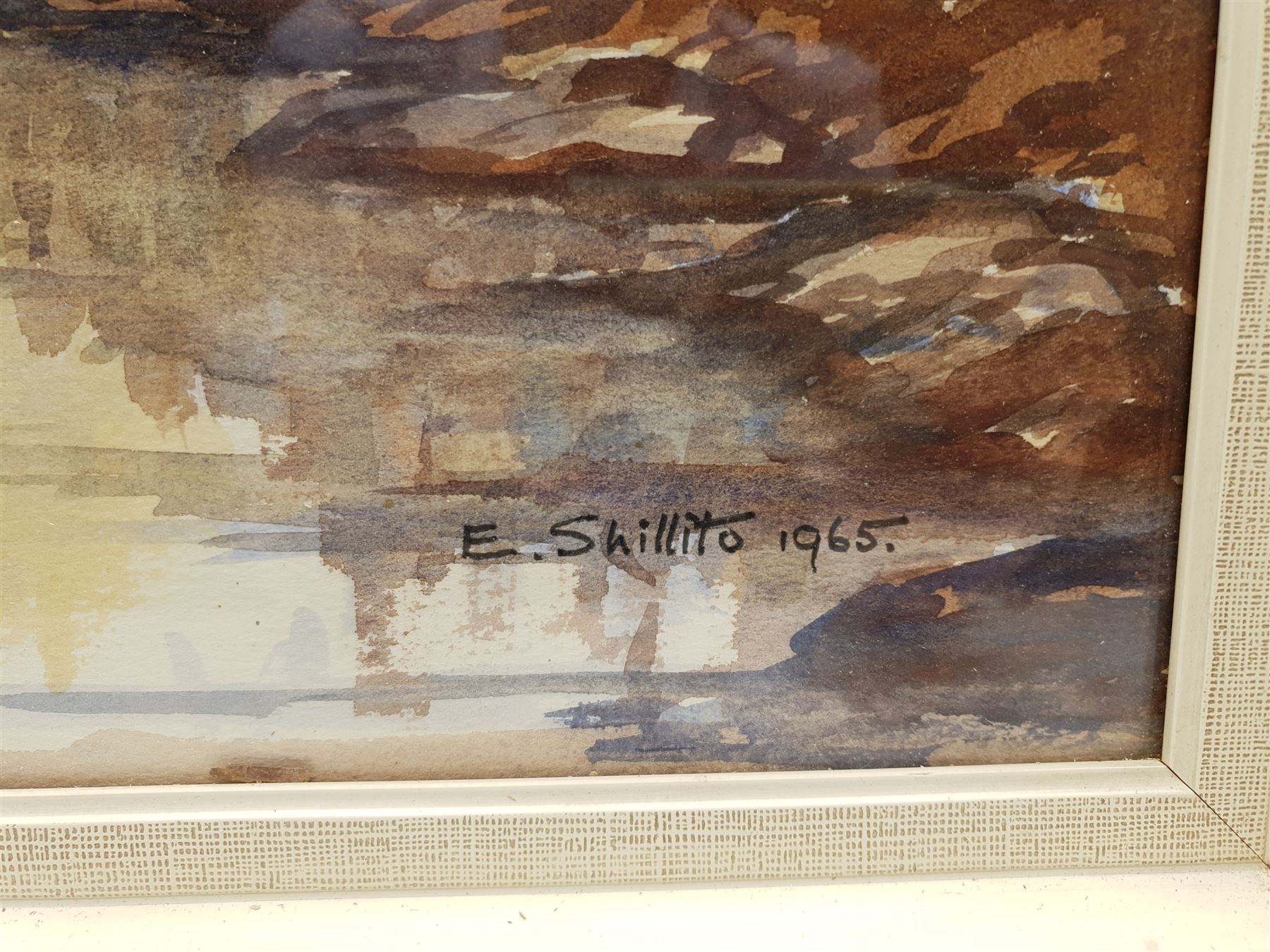 E Greig Hall (British 20th century): 'Striding Edge Helvellyn', watercolour signed, titled and dated '73 verso; 'Summer in Wharfedale' and Yorkshire Landscape, two watercolours signed E Shillito, max 49cm x 37cm (3)