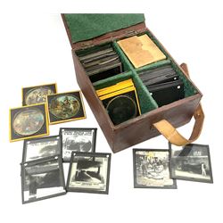 Set of twelve late 19th century magic lantern glass slides entitled 'A Negro's Life', together with forty-two further assorted late 19th/early 20th century magic lantern slides including Union Castle Line to South-East Africa by H.L. Toms London etc, housed in a wooden baize-lined box