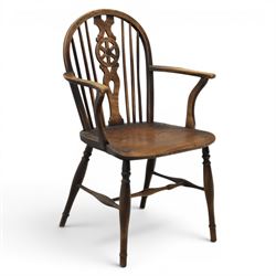 Late 19th century elm and ash low-back Windsor chair, swept arms raised on turned supports...