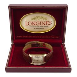 Longines gentleman's 14ct gold tank wristwatch, Cal 22L, serial No. 7593519, case No. 811582, the rectangular silvered dial with diamond set hour markers and subsidereary seconds dial, stamped 14K, on tan leather strap with original buckle, boxed