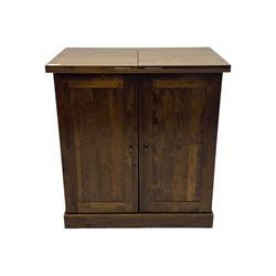 Laura Ashley - contemporary 'Garret' birch and dark chestnut finish bar cabinet, rectangular top with fold-out sides, double front doors enclosing shelving, wine racks, and glass storage, built-in stemware racks and bottle compartments, raised on plinth base