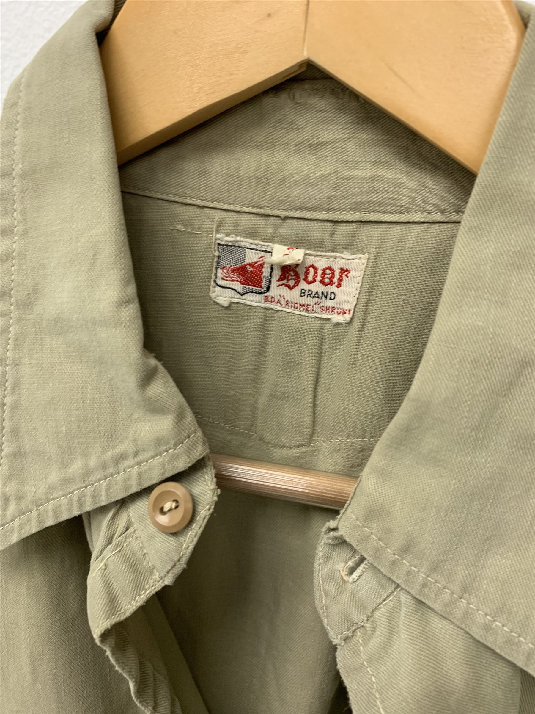 Mid 20th century Boy Scouts uniform, comprising corduroy shorts, further pair of shorts, two shirts, socks, and felt hat, together a framed collection of Ogden's 'Boy Scots' cigarette cards, and an unframed print of Lord Baden Powell. 