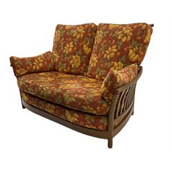 Ercol Renaissance elm two seat sofa, loose cushions in terracotta fabric