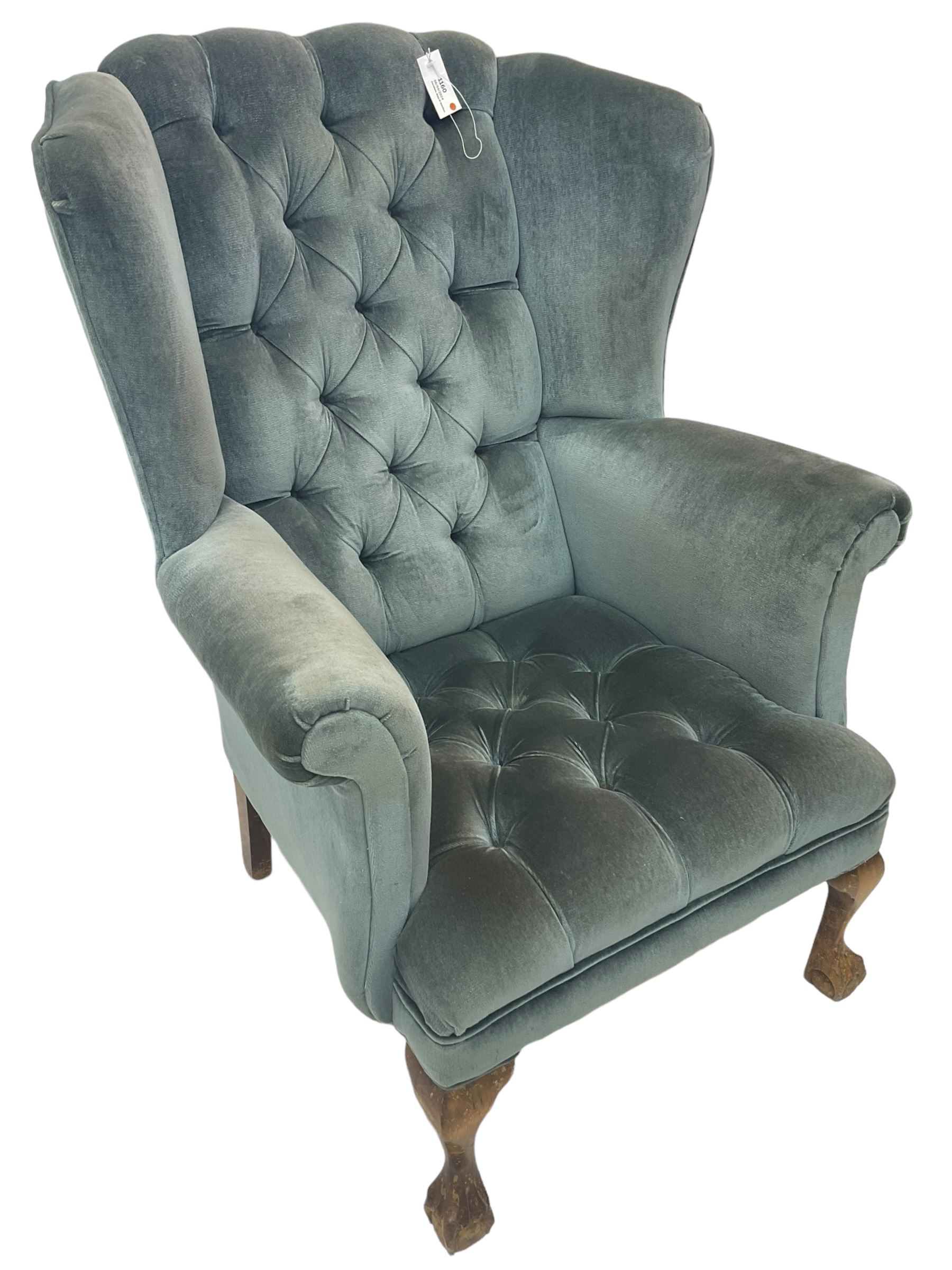Georgian design wingback armchair, traditional shape with rolled arms, upholstered in teal velvet fabric, on cabriole supports with ball and claw feet