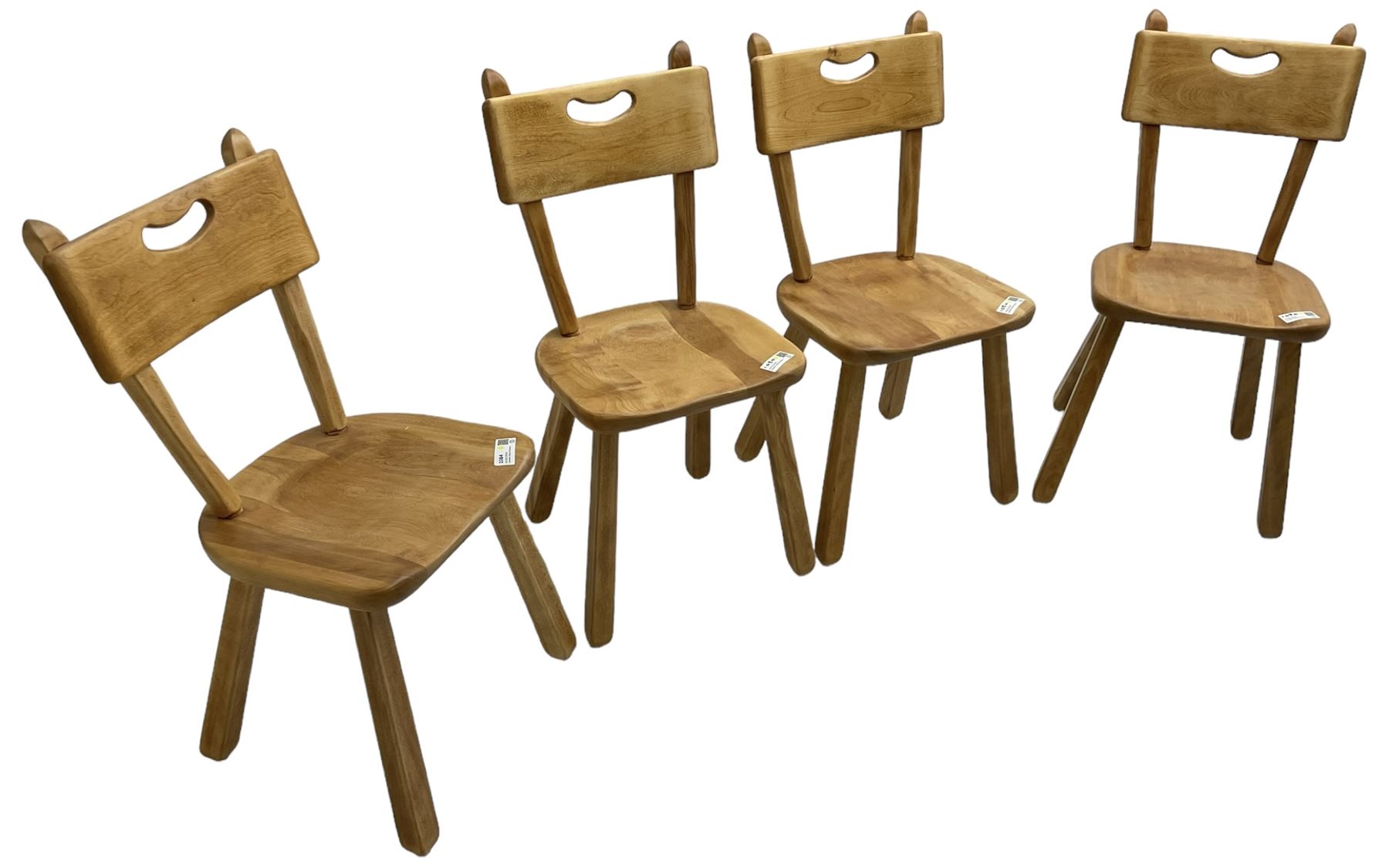 Imperial Canada - set of four mid-20th century birch dining chairs, bar back with pierced handle, dished seat on square tapered splayed supports