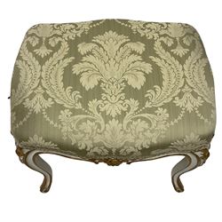 20th century French design parcel gilt and painted dressing table stool, upholstered in sage green damask fabric, shaped form on floral carved cabriole supports, with matching cushion 