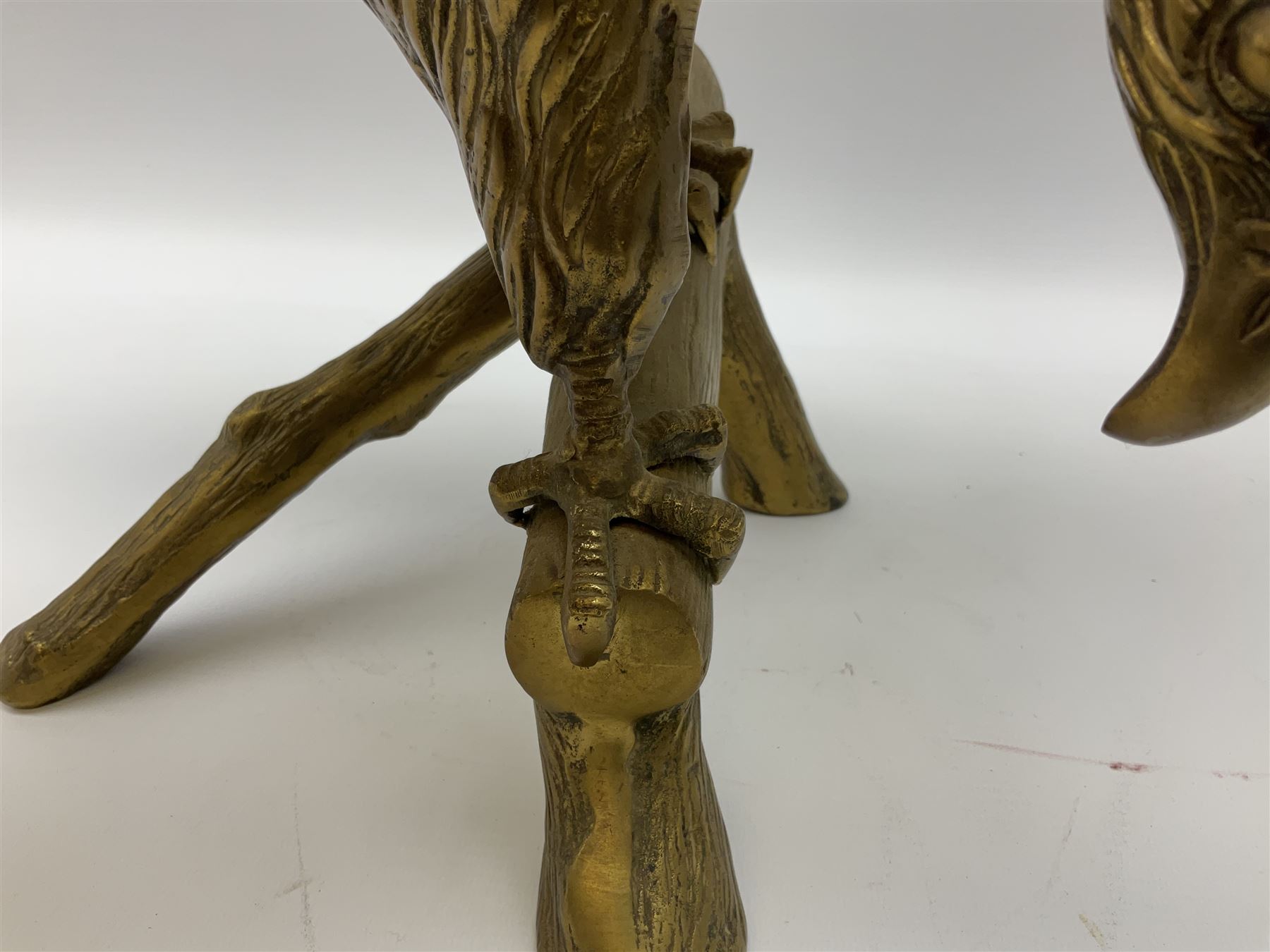 Large brass figure of an eagle on a branch, H51.5cm