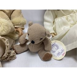 Two Zapf Creation limited edition designer collection dolls, by Brigette Paetsch, the first example with faux suede jacket, red jumper and denim skirt, no. 460, the second example 'Linda' in white dress with teddy bear accessory, no. 785, each signed B Paetsch, tallest L60cm