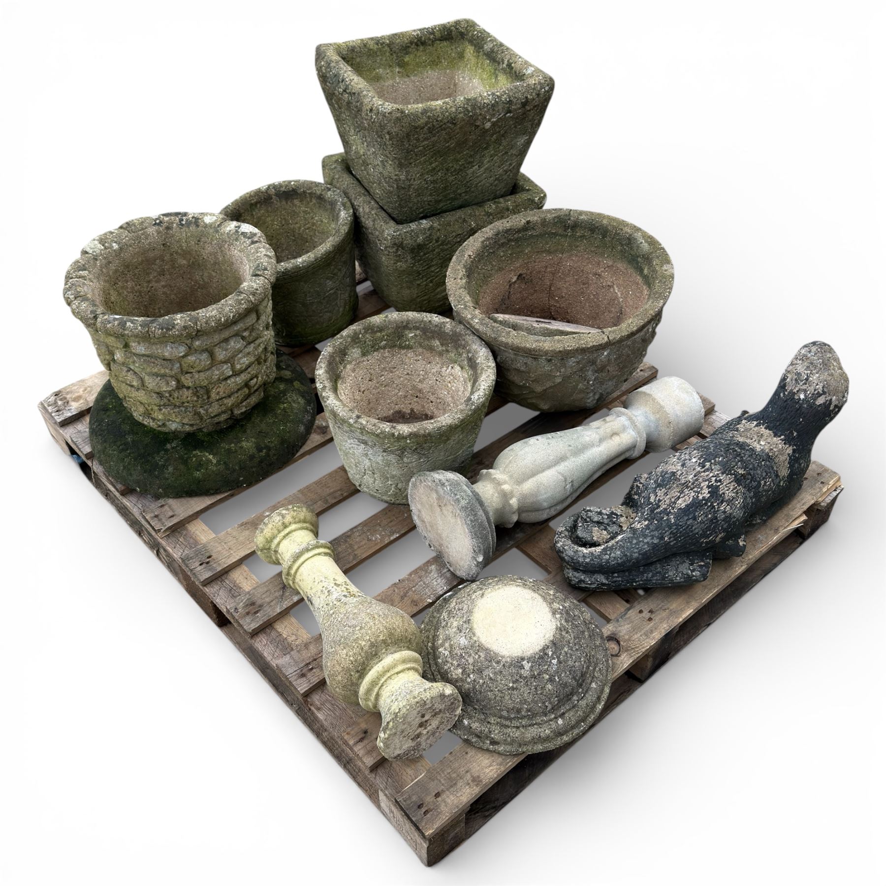 Collection of various cast stone planters and other stone items