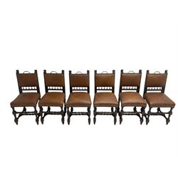 Set six early early 20th century oak dining chairs, cresting rail with pair carved lion mask mounts, back and sprung seat upholstered in tan leather, raised on turned supports united by stretchers