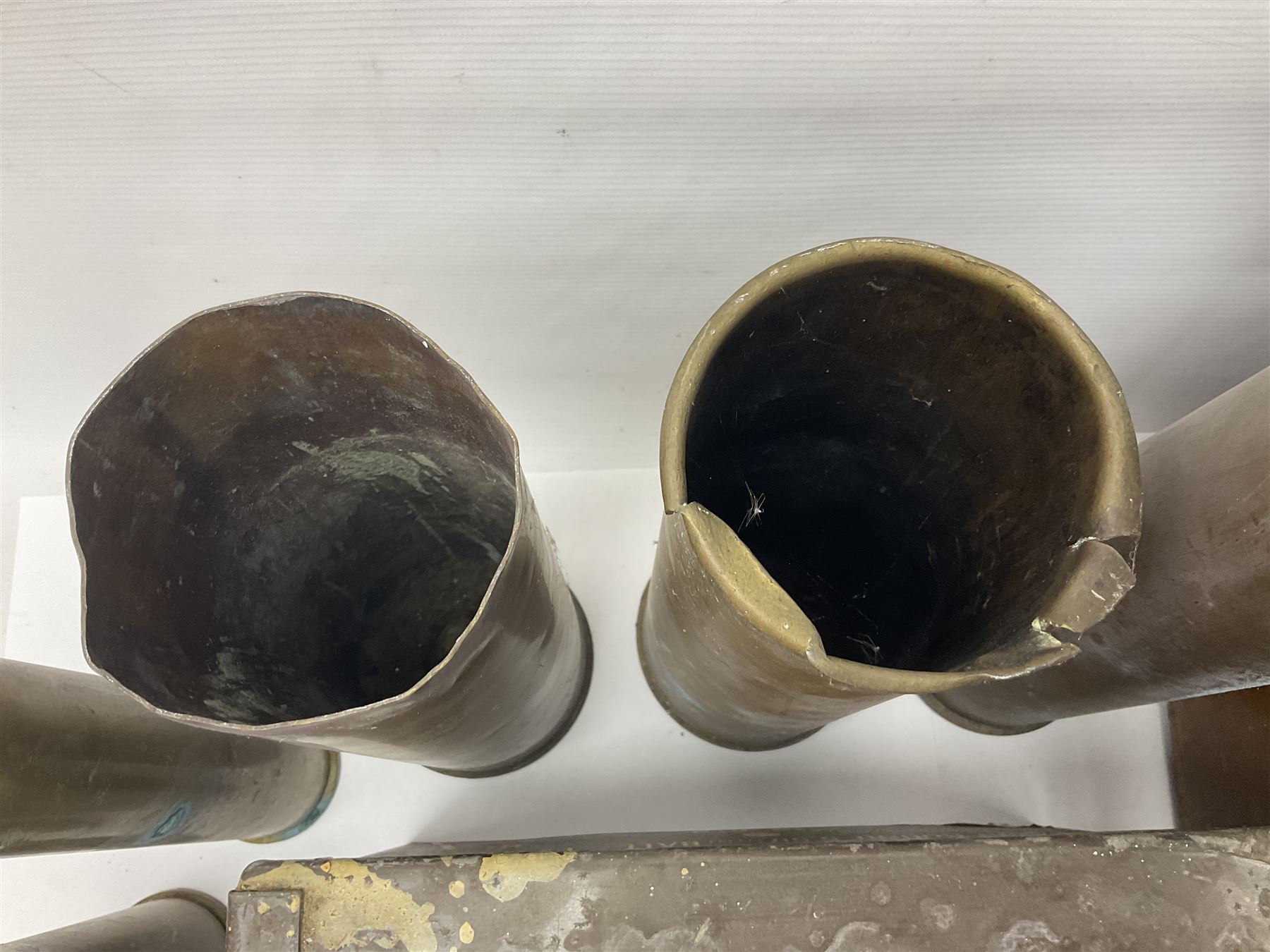 Large collection of shell and bullet casings, including a trench art example, together with a metal cartage case and wooden case