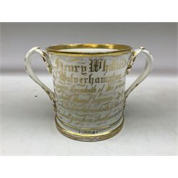 19th century loving cup, with decorated with religious iconography, a gilt rim and writing 'Henry Whittirld Wolverhampton, Whoever drinketh of the water shall thirst again but who soever drinketh of the water that i shall give him shall never thirst',  H14cm