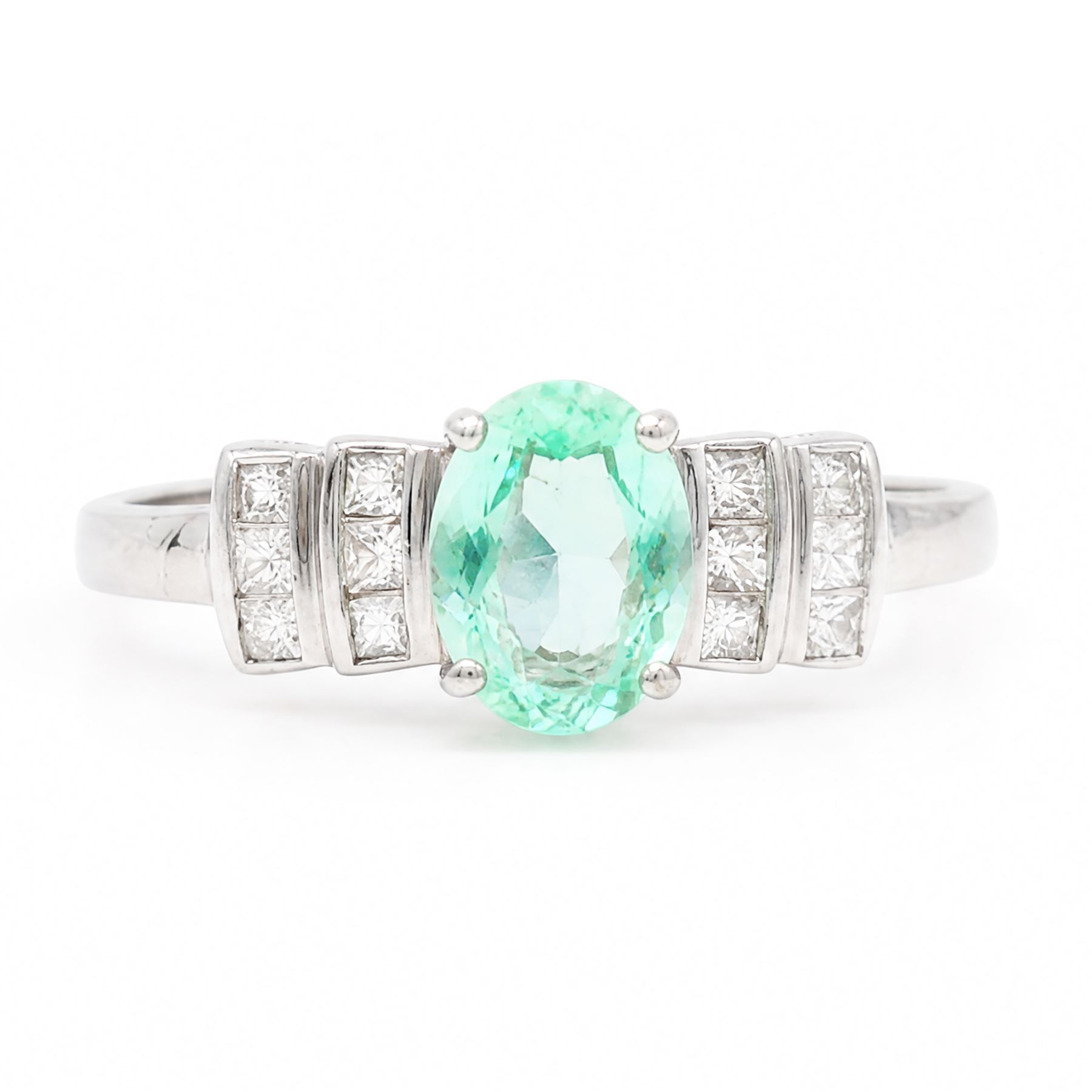 18ct white gold Paraiba tourmaline and diamond ring, single oval cut tourmaline of approx 0.90 carat, with six princess cut diamonds either side, in a stepped design setting, hallmarked, total diamond weight approx 0.35 carat