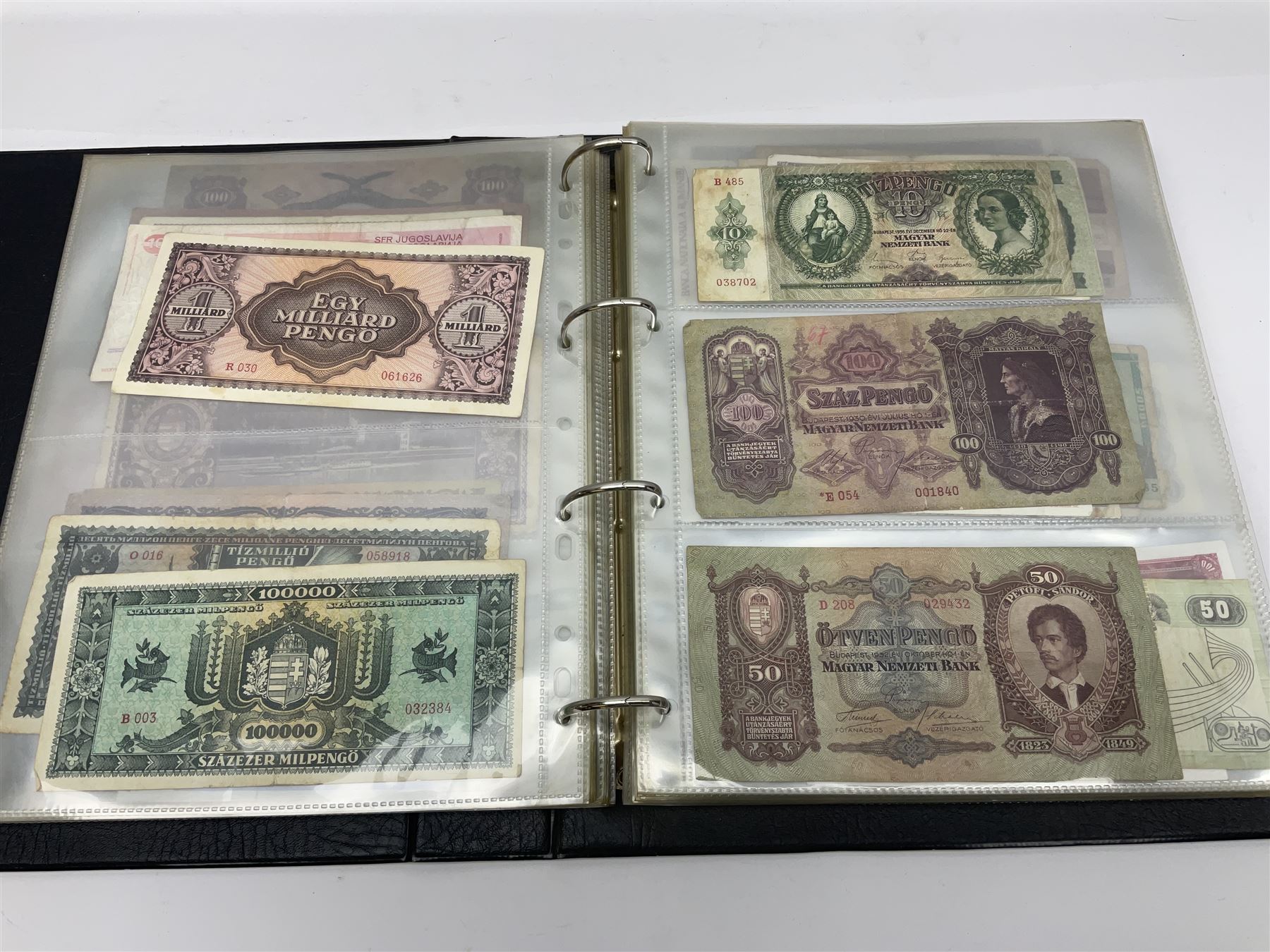 World and Great British banknotes to include Brazil, Canada, France, Germany, Ghana, Indonesia, Iraq, Hong Kong, Hungary, Japan, Vietnam, Zimbabwe, a collection of Chinese ‘Hell Money’, and quantity of ‘De La Rue Systems’ test notes, housed in ring binder and loose