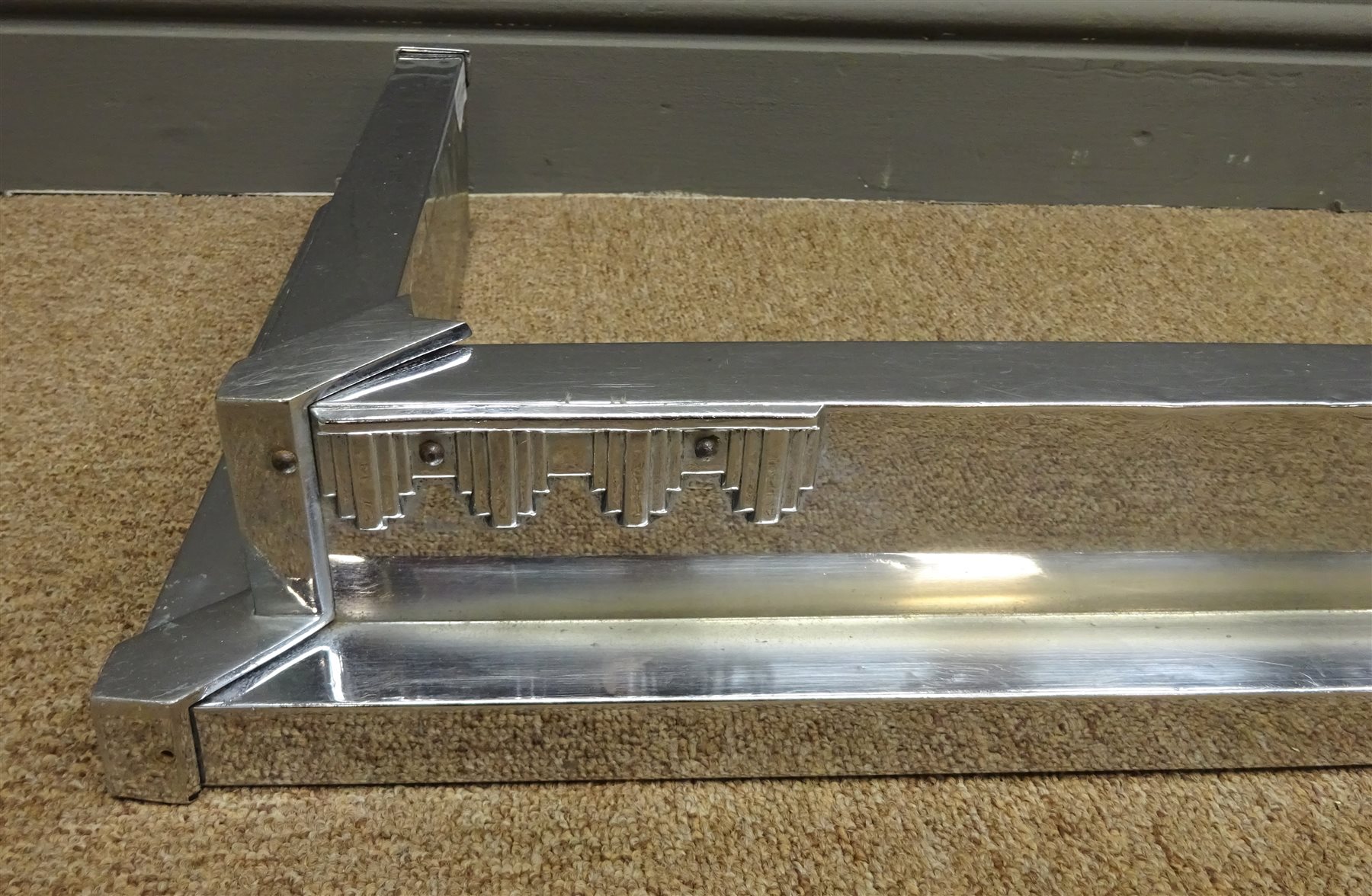 Art Deco chrome fire fender with stepped design by W & P Ltd