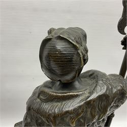 Pair of bronzed figure modelled as a hunter in traditional dress, each holding a pike, H48cm