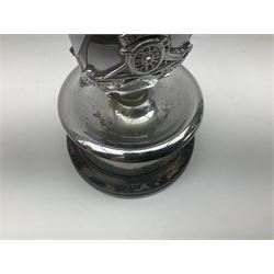 Royal Artillery presentation chromed metal table lighter, circular stand with silver band hallmarked London 1956 and ebonised base, H16cm