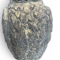 Pair of large composite stone garden statues modelled as standing horned owls, raised on circular bases