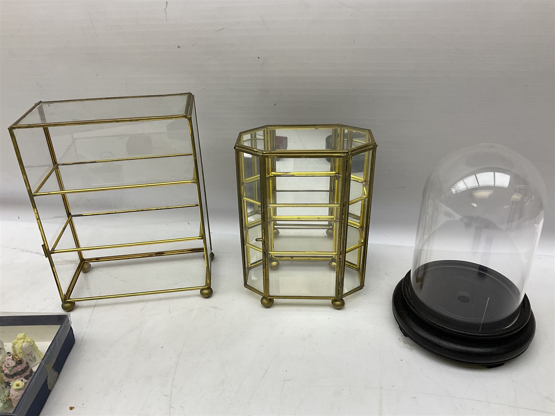 Quantity of thimbles to include twelve Irish Dresden lace examples, Royal Crown Derby, Spode, Portmeirion, Wedgwood, Royal Grafton etc, together with three display cases, many with certificates