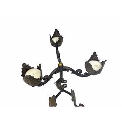 Modern Continental decorative crucifix, H62.5cm, together with a three branch candelabra, H34cm