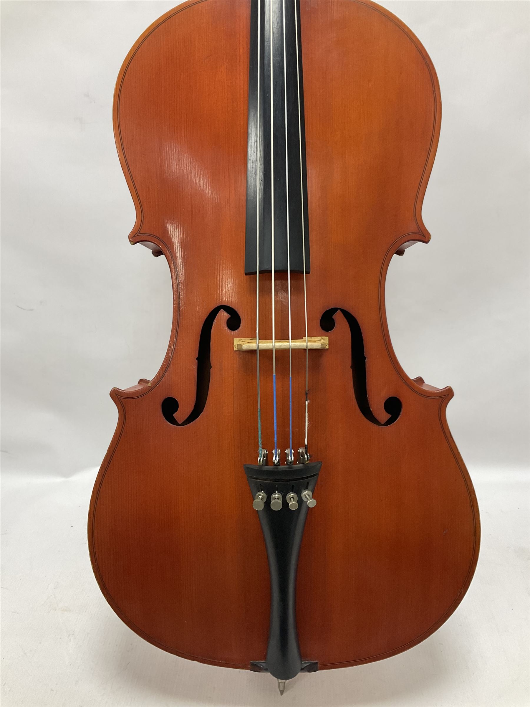 3/4 size cello with soft case, 69cm back length, 114cm full length, with bridge, ebonised tail piece and fingerboard.