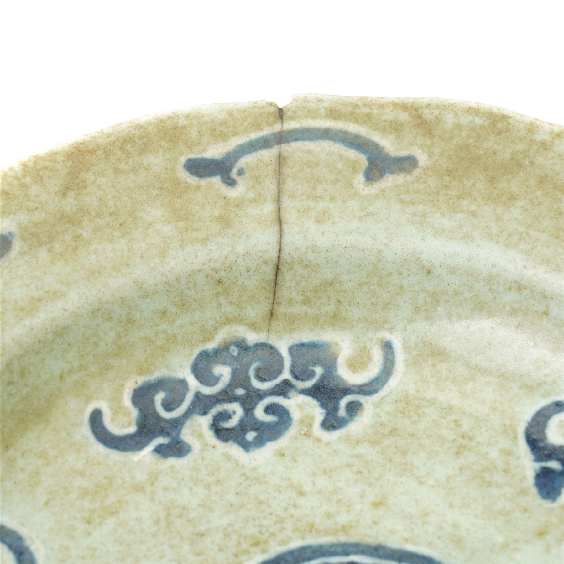 Chinese celadon dish, painted with bats in underglaze blue and with central Shou character to bowl, bearing apocryphal four character Chenghua mark to base, D26cm
