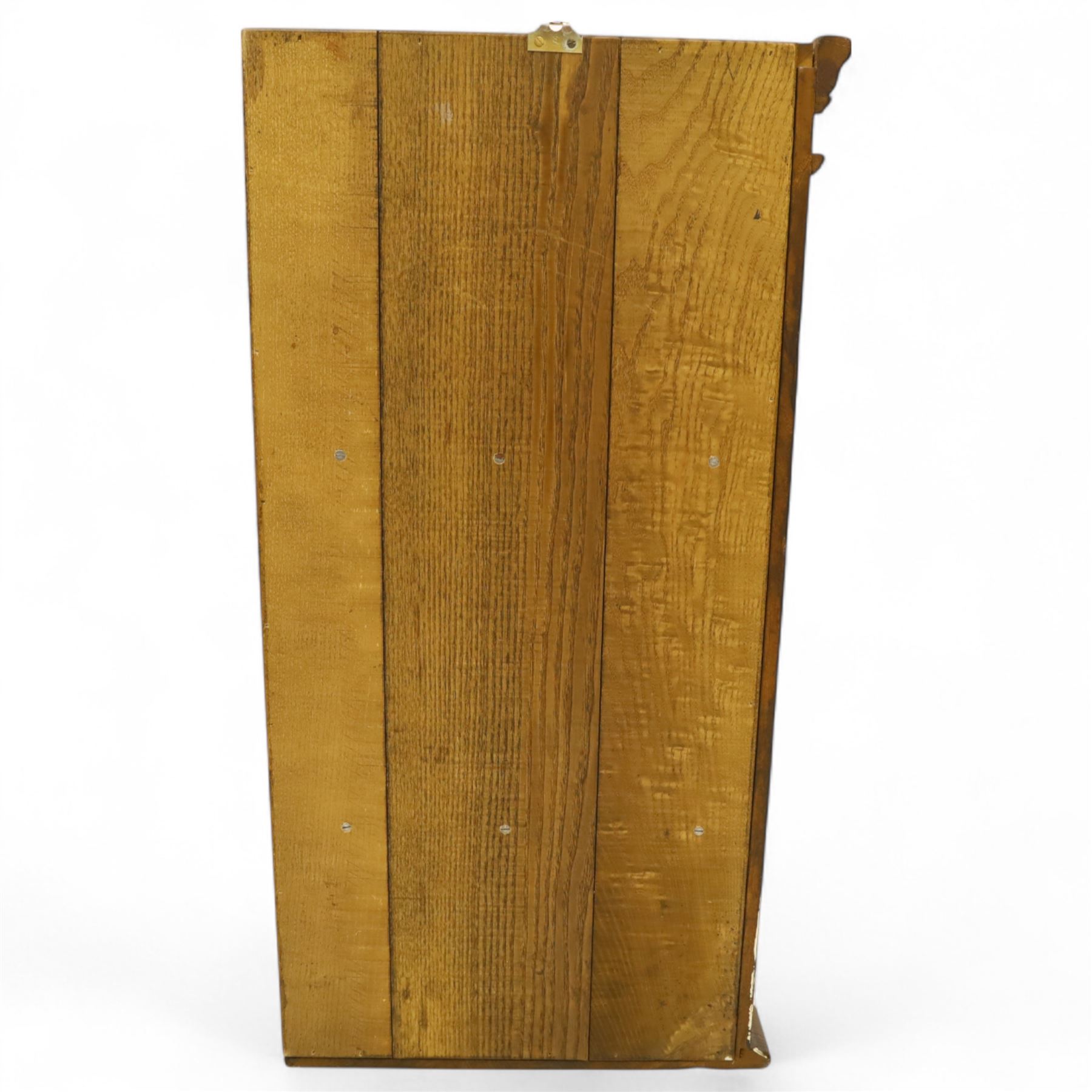 Early 20th century oak wall-mounted corner cabinet, moulded cornice above a single glazed door with six-panel astragal glazing, fitted interior with two shaped shelves