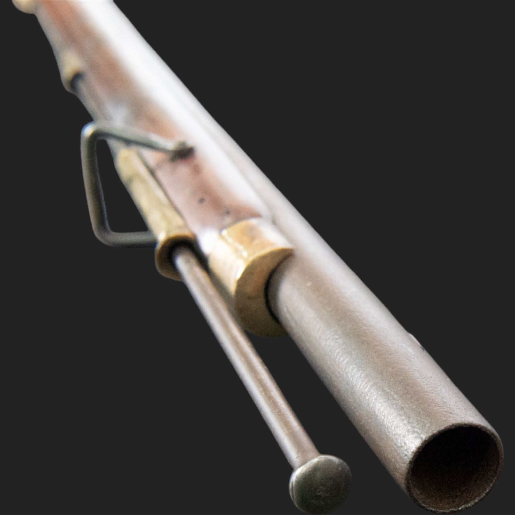 Brown Bess flintlock musket, 37in barrel, action marked with crowned GR and Tower, with brass mounts, the thinned butt marked 38, sling swivels, steel ramrod, overall L132cm
