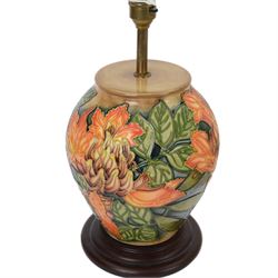 Moorcroft table lamp in Flame of the Forest pattern, of baluster form, on stepped wooden base, H35cm (excluding fitting)
