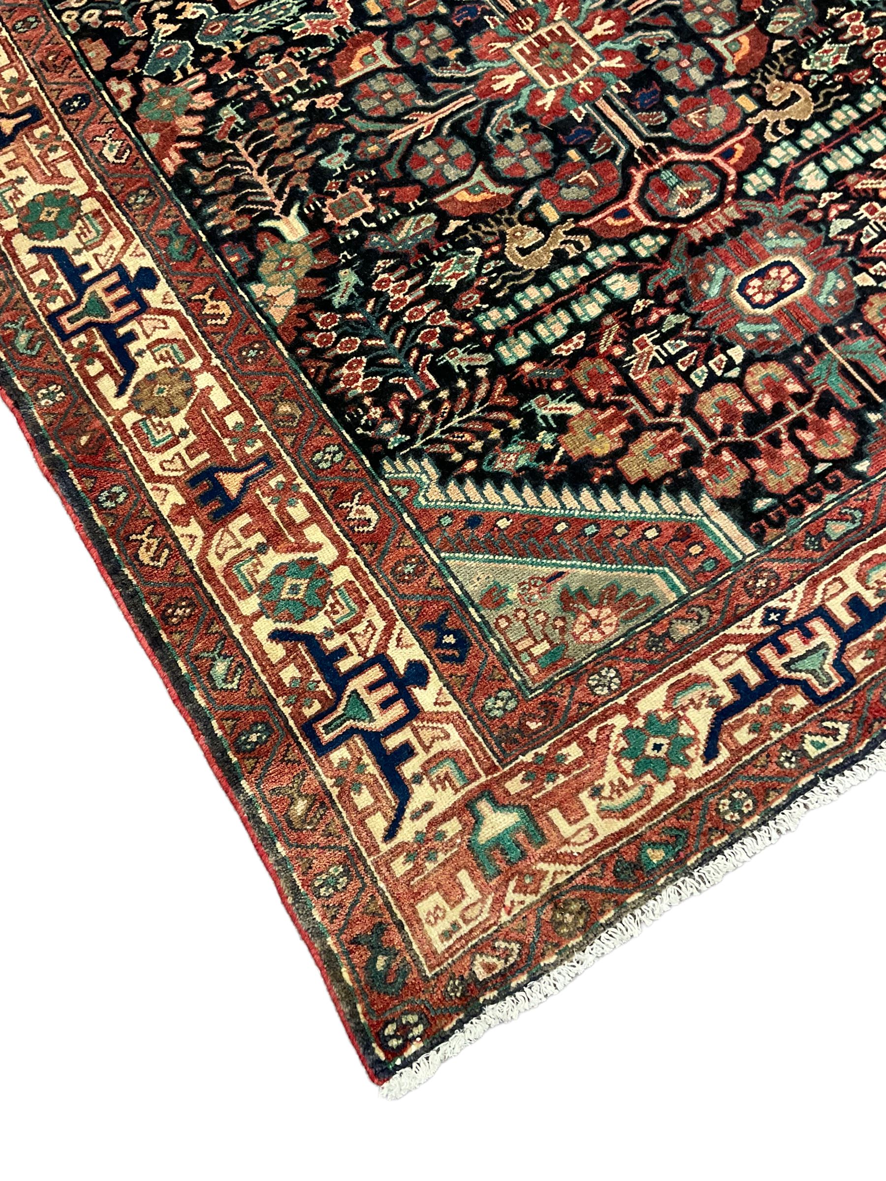 Persian Malayer rug, the field decorated with tree of life, floral