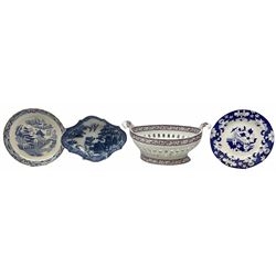 Group of 19th century ceramics, comprising Staffordshire pearlware chestnut basket, possibly Davenport, with twin handles, pierced sides, and transfer printed decoration in puce, H13.5cm L30cm, Spode Willow pattern dessert dish of shaped lozenge form, with impressed mark beneath, L23cm, Miles Mason Willow pattern dish, and a Rogers plate decorated with a figure under a parasol within a fenced garden, with impressed mark beneath. (4).