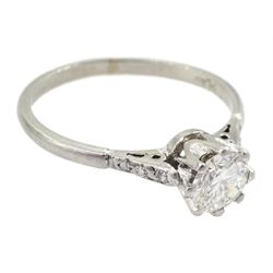 Platinum single stone round brilliant cut diamond ring, with diamond set shoulders, stamped Plat, diamond approx 0.55 carat