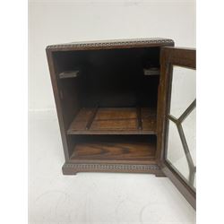 Smoker's cabinet,  with a fitted interior and a small mirror, with hinged compartment to the front, mirror H43cm (2)