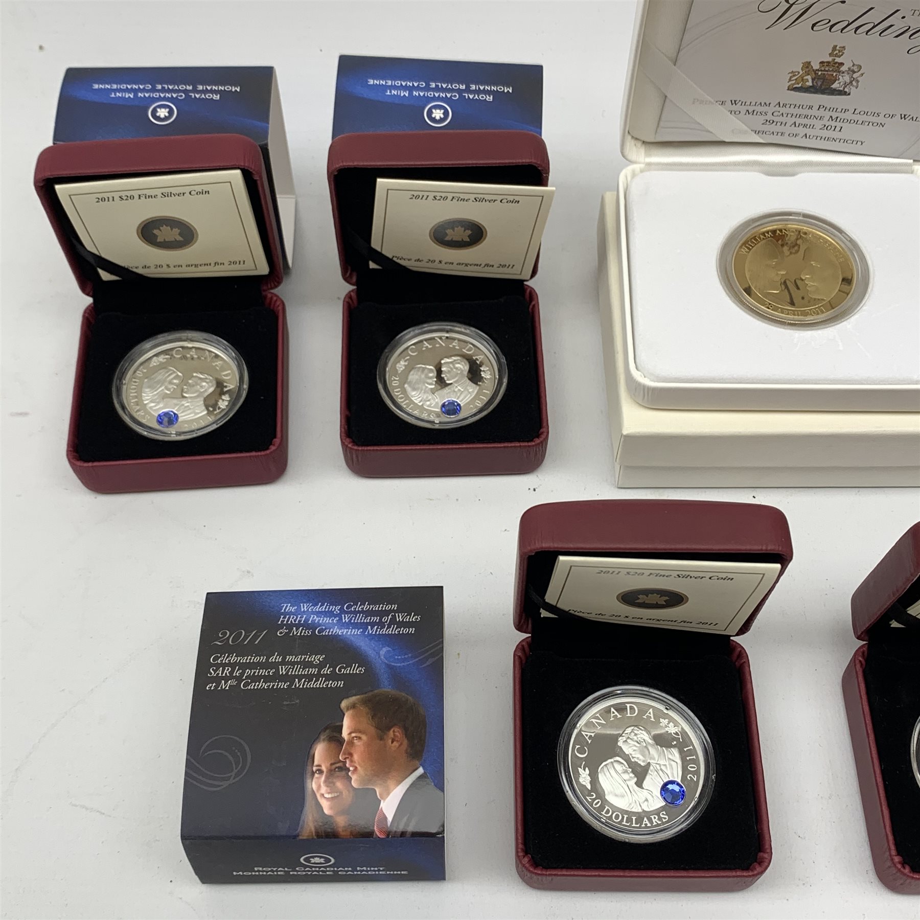 Six Royal Canadian Mint twenty dollar fine silver coins, all 2011 commemorating 'The Wedding Celebration HRH Prince William of Wales & Miss Catherine Middleton' and a Royal Mint 'The Royal Wedding' 2011 gold plated sterling silver five pound coin (7)