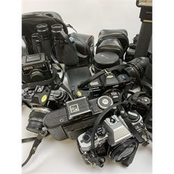 Vintage cameras lenses and accessories including Olympus 'OM10' camera body, Olympus 'OM4' camera, 'Olympus OM-System Zuiko auto-zoom 35-70mm 1:4' lens, various other lenses, tasco binoculars etc, in one box