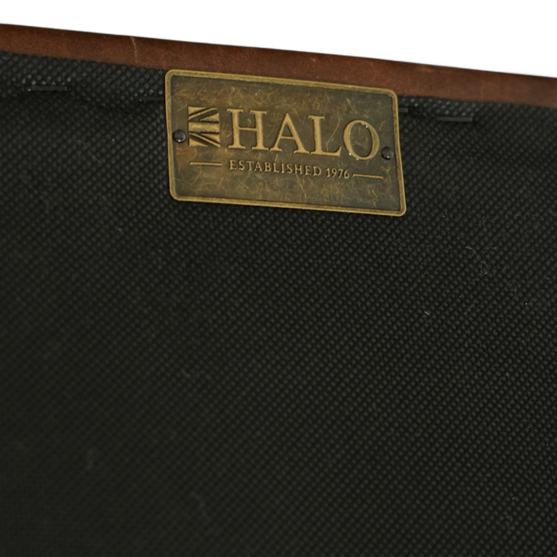 Timothy Oulton, Halo - late 20th century brown leather Chesterfield settee, the upholstered frame with deep buttoning to back and arms, large scroll terminals with brass studwork, twin seat cushions, raised on castored legs