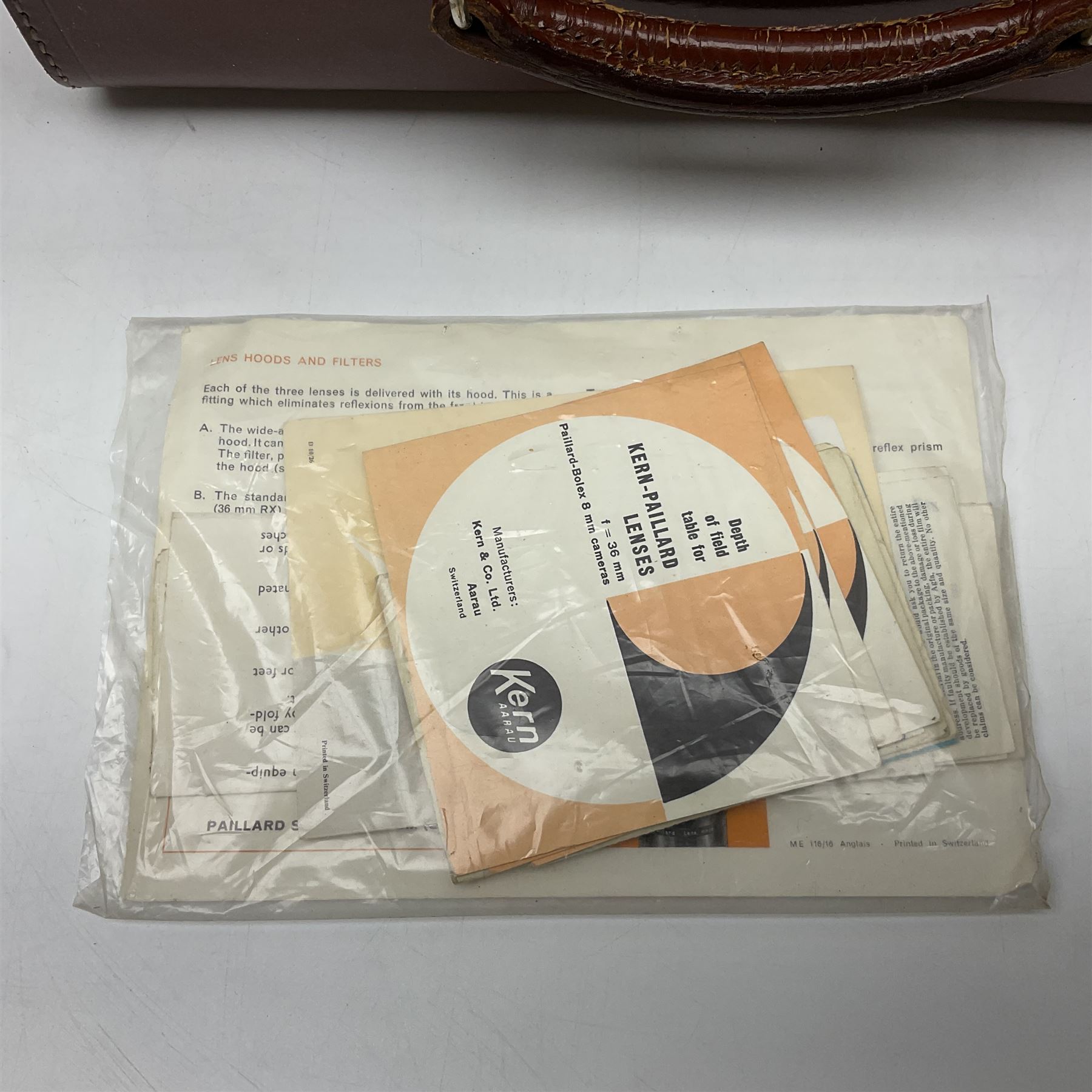 Paillard Bolex H8 RX4 cine camera body with turret for interchangeable lenses, serial no. 216071, with 'Macro Switar H8RX f1.4 36mm' lens, serial no.863406, 'Macro Switar H8RX f1.3 12.5mm' lens, serial no. 865770, 'Switar H8RX f1.6 5.5mm' lens, serial no. 937691 and RX fader, in fitted leather case