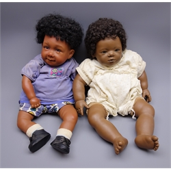  Annette Himstedt brown vinyl baby doll 'Mo' with curly hair, brown eyes and velveteen cloth body with vinyl lower limbs and another similar vinyl baby doll by Pat Secrest 'Mylo' , both H55cm (2)  