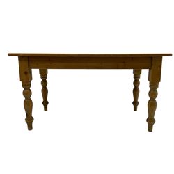 Polished pine farmhouse design dining table, rectangular top on turned supports 