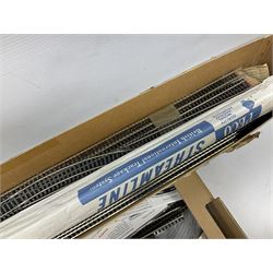 '00' gauge - large quantity of track by Peco, Hornby etc including various straight lengths and curves, points, Tracksettas etc; some still in packaging; in two boxes
