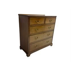 Edwardian mahogany chest, fitted with two short and three long drawers, on bracket feet