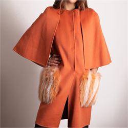 Fendi Roma - wool cape coat in 'Cayenne' orange peach, with concealed front fastening and short flared cape sleeves, applied with dyed arctic fox fur patch pockets, size 40, unused with original tags