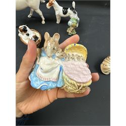 Two Royal Doulton figures of puppies in baskets, together with Beswick horse and other animal figures