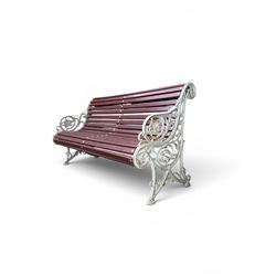 Large late Victorian cast iron garden bench, serpentine form with scroll back and seat, sl...