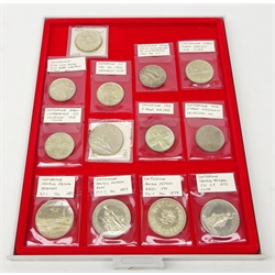  Thirteen 19th century and later Swiss five Franc coins including shooting festival 1861, 1872, 1879, 1881 and 1885 five francs etc, displayed in a Lindner coin tray  
