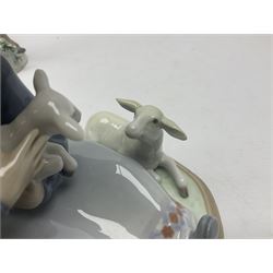 Three Lladro figures, Faithful Steed no 5769, Best Foot Forward no 5738 and Lambkins no 5469, all with original boxes, largest example H21cm 