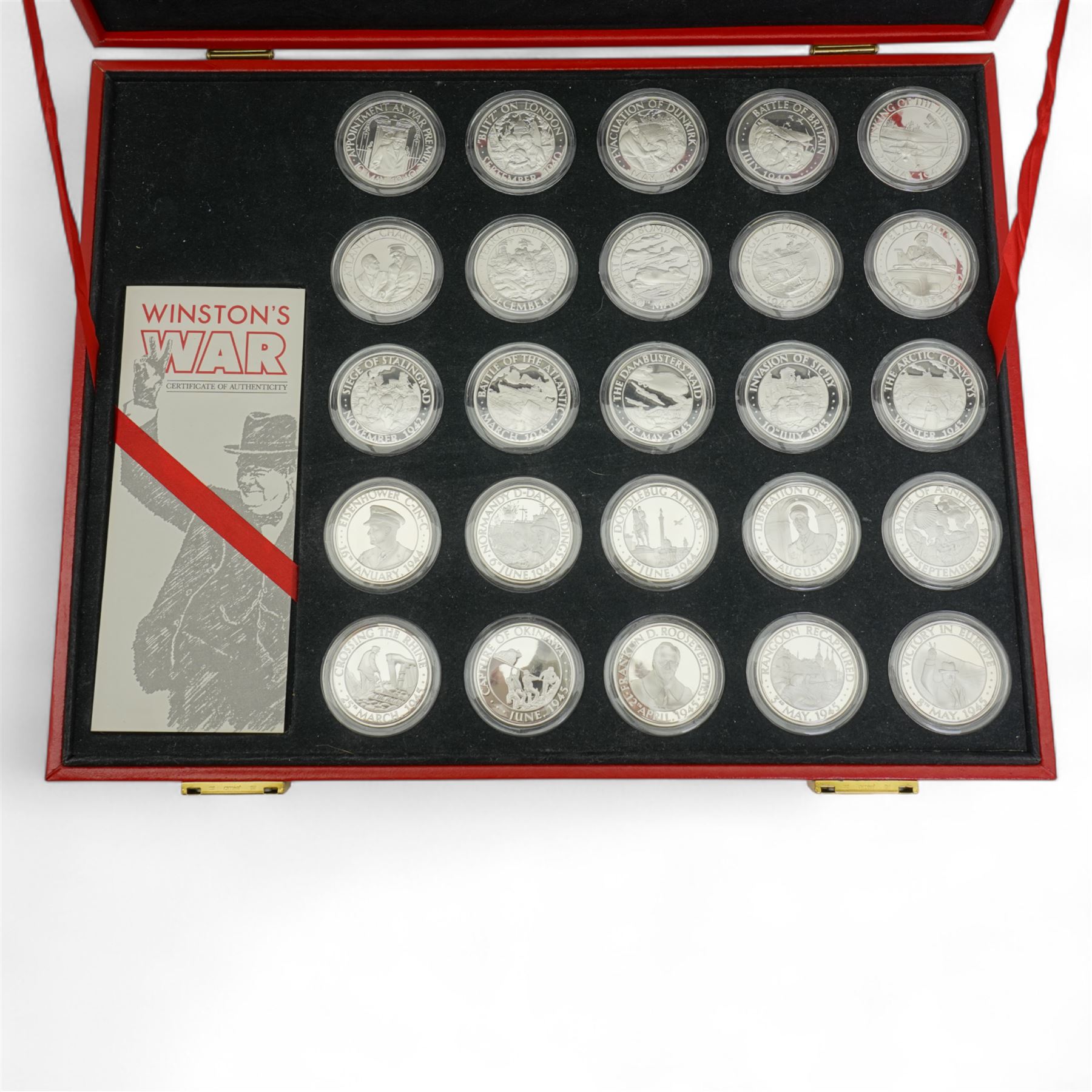 Winston Churchill, 'Winston's War' - Limited edition set of twenty five silver medals struck by Spink & Son, issued to commemorate 50th anniversary of Churchill's wartime premiership, all within capsules and red leather case with certificates etc 56/5000