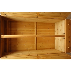  Solid pine wardrobe, two panelled doors above single drawer, on bun feet, (W90cm, H180cm, D52cm) and a pine chest of four drawers, bun feet (W75cm, H86cm, D46cm)50  