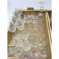 A large quantity of drinking glasses, to include a boxed pair of Royal Doulton tumblers, boxed set of six Stuart Crystal liquor glasses, boxed pair of Stuart Crystal tumblers, boxed pair of Stuart Crystal tall tumblers, together with various wine, brandy, sherry and liquor clear cut glasses, plus a boxed Royal Albert decanter, two further decanters, and a boxed Edinburgh Crystal jug. 